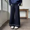 Calça jeans estilosa e moderna de corte solto para meninas, com design da moda, versátil acabamento em renda e estilo casual de perna larga, perfeita para crianças mais velhas.