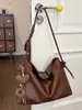 Bolsa de ombro vintage transfronteiriça para mulheres, nova bolsa de axila de nicho de alto valor, bolsa versátil de ombro e transversal atacado