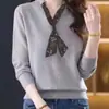 Top de manga larga con cordones, diseño de bloques de color y procesamiento OEM, suéter de punto versátil y adelgazante para mujer