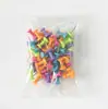 Uñas de color en forma de I 50 bolsas de material PS transparente chinchetas de plástico dorado empaque cuantitativo procesamiento puede hacer color fijo