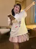 Conjunto de manga corta estilo coreano para niña 2026s verano camiseta con estampado de lazo y falda rosa botón conjunto de dos piezas atuendo de moda