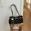 Bolso tipo baguette de lunares transfronterizo, diseño nicho coreano, elegante para ir al trabajo, bolso de hombro casual con decoración de cinturón