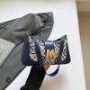 Bolso de axila con letra retro para mujer 2025 Nuevo bolso de hombro de moda de nicho de alta gama Bolso estilo occidental tipo baguette