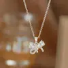Nuevo Collar Colgante de Estrella con Lazo y Borla Estilo Hada Moda Femenina Simple de Gama Alta Lujo Ligero Cadena para Clavícula
