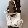 Bolsa de lona tipo tote para estudiantes universitarias, versátil y de gran capacidad, adecuada para ir al trabajo y llevar libros a clase, con cierre.