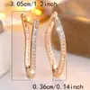 Pendientes Asimétricos en Forma de V Dorados Champagne de Moda Populares en Aliexpress con Microincrustaciones de Diamante Blanco Pendientes Exquisitos Versátiles Europeos y Americanos