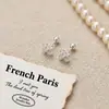 Brincos de Tarraxa Cruz de Prata Esterlina 999 com Diamante para Mulheres Luxo Leve Versátil Simples para Cartilagem da Orelha Design de Nicho Brinco de Rosca