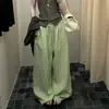 ¡Muy recomendable! Pantalones de lino verde de pierna ancha para mujer, nuevo estilo principios de otoño 2026, con una caída minimalista, pantalones de pierna recta de moda