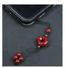 Cadena para teléfono móvil de cinabrio, arena de cristal, llavero con bronceado, corazón, sutra, colgante para bolso, llavero, colgante de la verdad de seis palabras, venta al por mayor