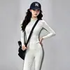 Conjunto de Ropa de Yoga para Mujer: Conjunto Deportivo de Dos Piezas con Chaqueta Corta de Cuello Alto con Cremallera y Hueso de Pescado, Rayas Laterales y Pantalones de Cintura Alta Ligeramente Acampanados