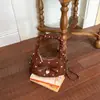 Bolso pequeño súper popular para mujer, nuevo bolso de hombro cruzado estilo Melard de ante para el otoño 2026