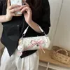 Bolsa de mão fashion e doce estilo coreano com laço e poá, compacta e estilosa, elegante bolsa transversal cilíndrica