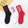 Nuevos calcetines altos de letras ins Cola estilo coreano personalizados medias hip hop marca de moda callejera europea y americana calcetines para parejas hombres y mujeres