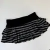 Minifalda de Color Bloque Rayado Línea A 2025 Sexy Moda Y2K Estilo Callejero Japonés y Coreano Nicho Chica Picante Versátil Ultracorta