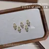 Joyería para Uñas Starburst Aleación Circonita Montón Diamante Alas Colgante Estrella Cuatro Picos Diamante Accesorios Decoraciones para Uñas