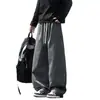 Moda de otoño e invierno para hombre, pantalones de trabajo deconstruidos modernos y únicos, pantalones de trabajo versátiles de estilo japonés con cordón, corte slim fit, holgados
