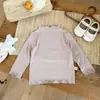 Ropa Infantil Niñas Ropa Interior 2026 Nuevo Estilo Niños Otoño Ajustada Volantes Cuello Semi-alto Manga Larga Ropa Interior Camiseta Moderna