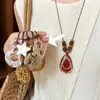 Polvo de Caramelo~Nuevo Collar Colgante de Estrella China de Cinco Puntas para Mujer 2026 Nuevo Estilo Estilo Festivo Accesorios de Nicho Únicos