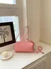 Bolso cilíndrico transfronterizo elegante con estampado de lichi para mujer, nuevo bolso casual de moda 2026 para hombro y crossbody tipo almohada