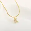 Nuevo Collar Europeo y Americano de Cobre Chapado en Oro Microincrustado con Circonita Collar de 26 Letras Simple y Moderno Colgante de Letra Inglesa
