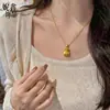 Mismo estilo que la tienda de oro retro arena dorada carácter Fu bolsa de la suerte femenina atraer riqueza y buena fortuna colgante de moneda collar temperamento de lujo ligero sensación de alta gama
