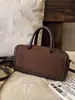 Nuevos dijes para bolso Otoño/Invierno 2026 Forma horizontal simple Bolso versátil de alta gama para mujer Bolso de mano vintage