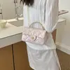 Bolso de cadena de estilo Chanel pequeño de alta gama nicho con estampado de diamantes para axila mujer 2026 nuevo estilo moderno versátil bandolera de un solo hombro