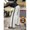 Calça de moletom com barra curva listrada para homens e mulheres, patchwork resistente de três listras, caimento solto, fluida, perna reta, casual, calça esportiva levemente flare