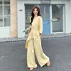 Verão 2026 Nova Moda Casual Emagrecedor Redutor de Idade Estilo Preguiçoso Fino Conjunto de Duas Peças: Top Irregular e Calça de Perna Larga