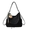 Bolsa Grande e Moderna para Mulheres Modelo 2026 Bolsa de Ombro Transversal de Nicho Retrô Bolsa Tote Casual para o Dia a Dia Mochila