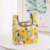 Bolsa de Compras Plegable Simple Portátil Mini Bolsa Ambiental Bolso de Mano Patrón de Muñeca Linda Tamaño Pequeño de Dibujos Animados