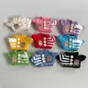 Ropa de bebé con botones de punto 17 cm primera, segunda y tercera generación Labubu accesorios para fiesta de sentarse, muñeco de peluche de perro