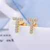 Comercio electrónico transfronterizo superventas 26 letras inglesas pendientes de circonita agujas de plata 925 pendientes exquisitos de diamantes completos pendientes