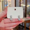 Brincos de coração super brilhantes com pino de prata S925, femininos, coreanos, de alto conceito, brincos de amor, brincos de cobre com zircônia incrustada, atacado