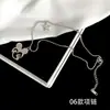 [56] logotipo de comercio exterior sin marca acero de titanio joyería Europa y Estados Unidos variedad de hip-hop apilado collar de clavícula de acero de titanio