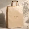 Bolsa de Papel Kraft Cor Original Personalizada para Roupas Sacola de Presente Sacola de Papel para Compras Estampada com Logo Espessada Fabricante Atacado