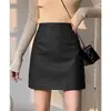 Nova saia de couro PU de cintura alta, corte A, emagrecedora, para outono e inverno, saia curta fashion, saia outerwear simples e versátil