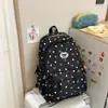 Mochila muy elegante para estudiantes universitarias, simple y de nicho, mochila ligera para chicas de secundaria y preparatoria, estilo fresco y juvenil