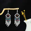 Brincos Étnicos Retrô Transfronteiriços Brincos Longos com Franjas Vermelhas Estilo Boêmio Brincos de Férias em Yunnan Estilo Exótico