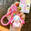 Llavero creativo de conejo de dibujos animados, bonito colgante de conejo con flores, llavero de muñeca, colgante de mochila escolar, regalo al por mayor