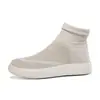 Nuevas zapatillas informales de talla grande con tejido volador para parejas, sin cordones, antideslizantes, a la moda, combinables con todo.