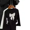 Ropa para Niñas Estilo Coreano Camiseta con Lazo Primavera y Otoño Nueva Versátil de Manga Larga para Niños Bebés Tops para Base de Otoño