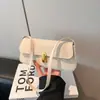Bolsa de ombro feminina para axila, coleção primavera 2026, moderna e estilosa, com design francês, uma bolsa de mão única e casual
