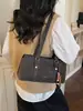 Bolsa Vintage de Nicho Melard para Mulheres Outono e Inverno 2025 Nova Versátil de Alta Qualidade para Ombro e Mão Bolsa Saco