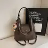 Bolso tote 2026 otoño nuevo modelo mochila de gran capacidad para el trabajo diseño de nicho bolso de hombro para mujer bolso cruzado multiusos