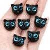 Gato lindo de ojos grandes imitación Cabeza de gatito de ébano accesorios de resina pequeño Xingshi agujero recto con cuentas pulsera DIY pulsera joyería