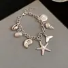 Colar com Pingente de Concha Estrela Pérola Estilo de Férias Moda Versátil Corrente para Clavícula Design de Nicho Joias para Mulheres
