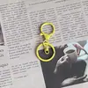 Llavero de fábrica de tres piezas diy marea jugar metal colgante gancho pintura llavero accesorios