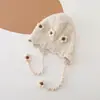 Gorro para bebé, gorro de punto de invierno, lindo diseño floral dulce estilo coreano, gorro que cubre las orejas, gorro grueso y cálido para bebés y niños pequeños