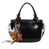Bolsos de Color Sólido de Moda para Mujer de Este Año 2025 Nuevo Estilo Versátil Bolso Cruzado Simple Bolso de Mano Estilo Coreano Bolso Cubo